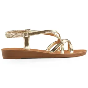 Sandales dorées pour femme à semelle plate d'or